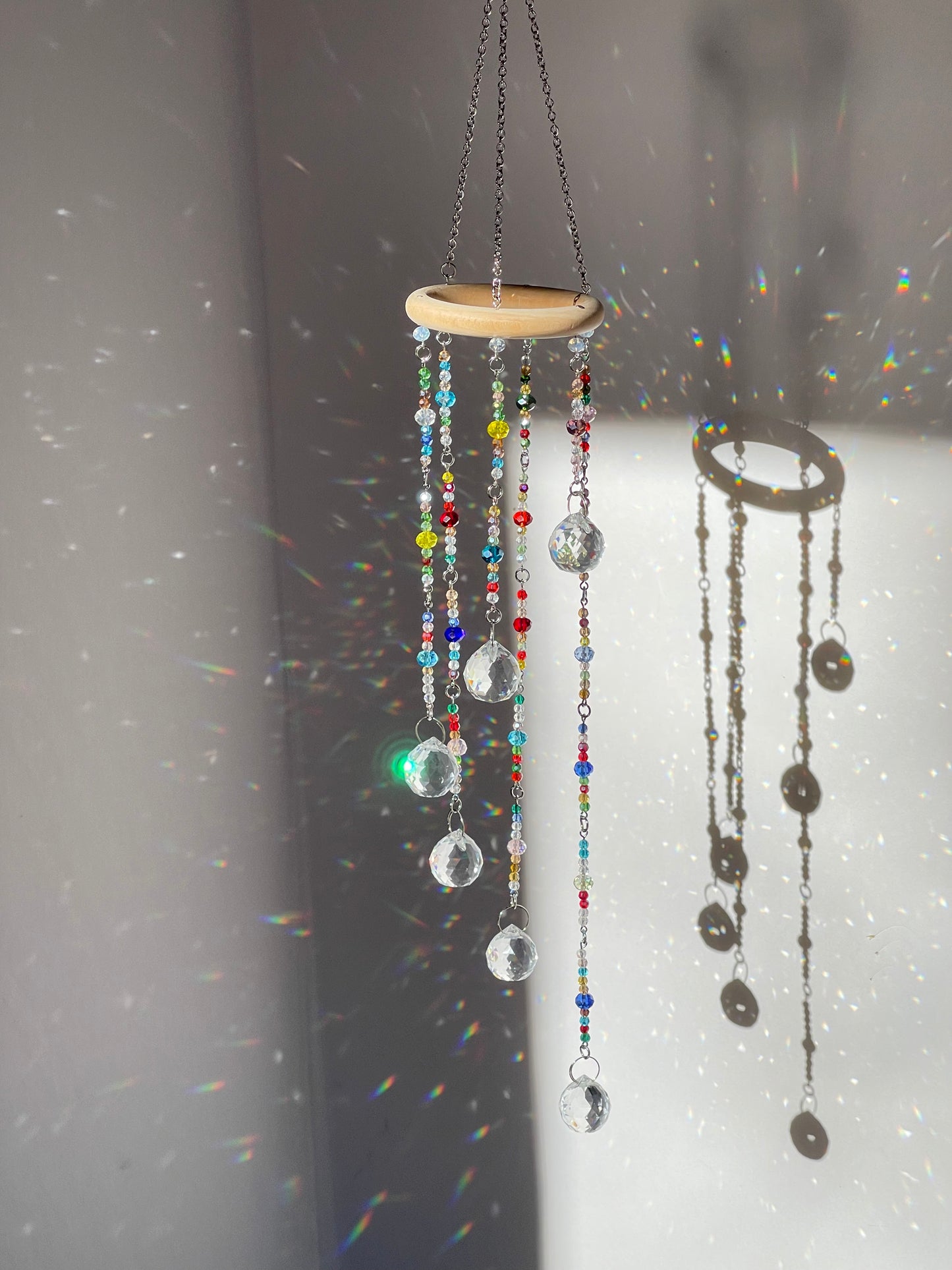 Full length view of 19 inch cascade crystal sun catcher with colorful glass beads